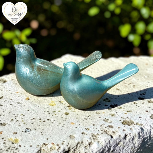 A Pair of Resin Memorial Birds
